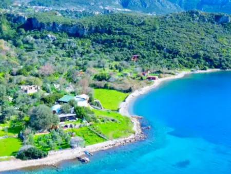 Marmaris Söğüt Köyünde Denize Sıfır 378M2 Yatırım İçin Uygun Satılık Tarla